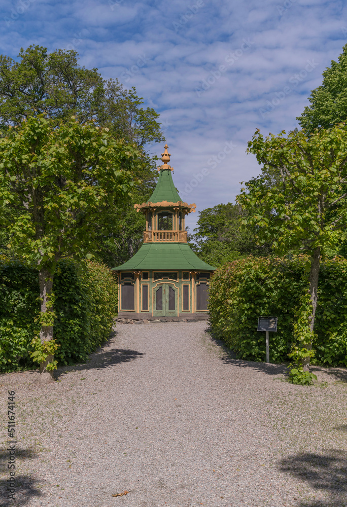 Chines styled 1700s old bird house on the Drottningholm island a sunny summer day in Stockholm
