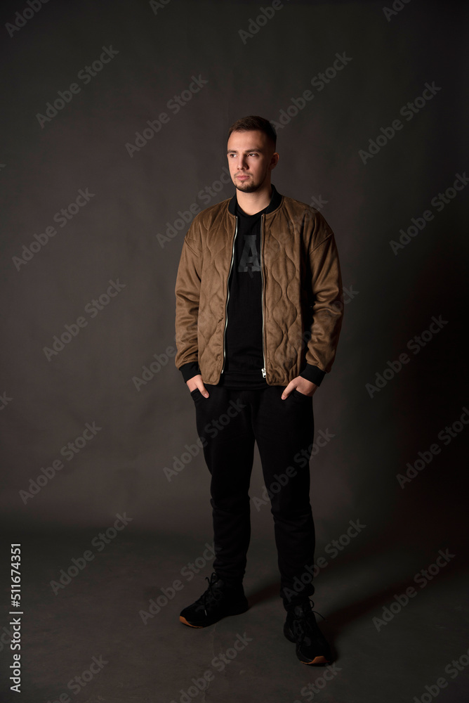 portrait of handsome man in dark studio portrait of handsome man in dark studio
