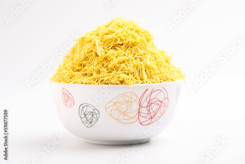 Sev. Besan Sev Indian Namkeen Noodles of chickpea flour. Besan Sev Popular Teatime Snack. photo