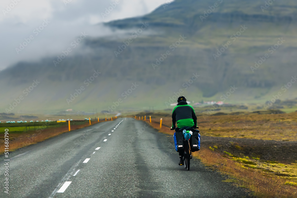 Touring bicyclist in Iceland - Drives on the road - summer season