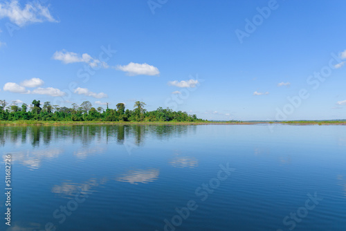 Large island in the lake. There is a beautiful cloud reflecting on the water At Bueng Kan Province of Thailand 5