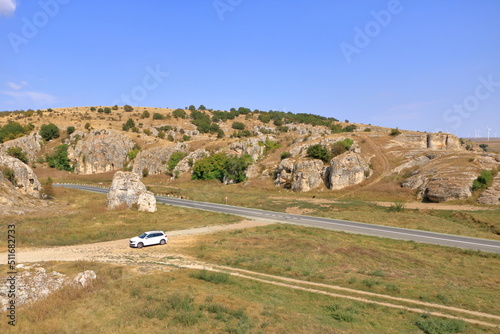 mountain landscape with some of the oldest limestone rock formations in Europe, in Dobrogea Gorges (Cheile Dobrogei), Romania photo