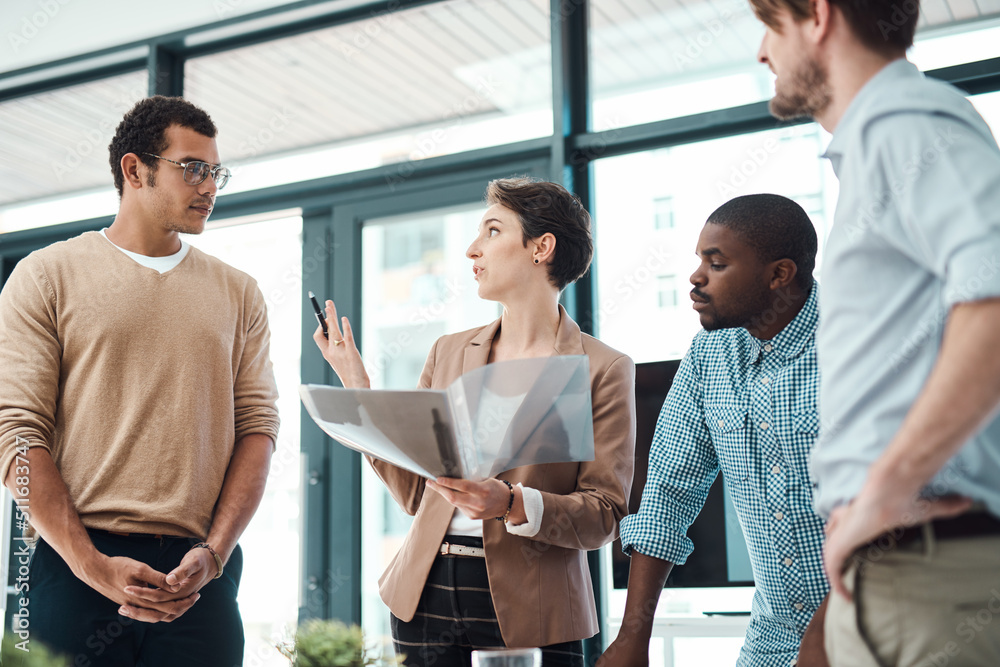 Generating new ideas to boost the growth of their business. Shot of a group of businesspeople having a discussion in an office. Generating new ideas to boost the growth of their business. Shot of a group of businesspeople having a discussion in an office.