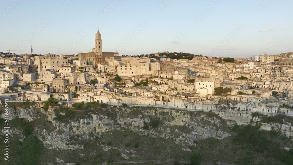 View from above, stunning aerial view of the Matera’s skyline during a beautiful sunrise. Matera is a city on a rocky outcrop in the region of Basilicata, in southern Italy. View from above, stunning aerial view of the Matera’s skyline during a beautiful sunrise. Matera is a city on a rocky outcrop in the region of Basilicata, in southern Italy.