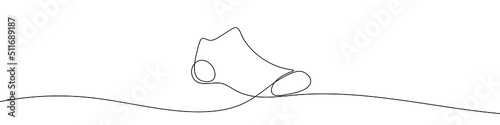 Continuous line drawing of socks. Socks one line icon. One line drawing background. Vector illustration. Socks black icon