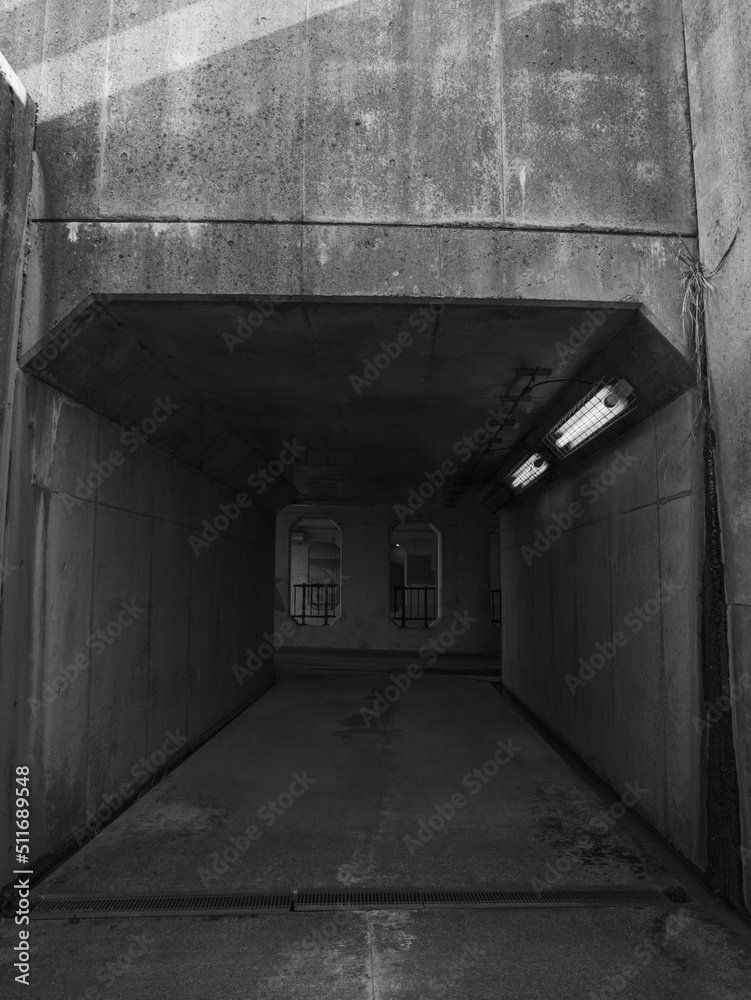 Obraz premium architecture, asphalt, background, building, concrete, dark, darkness, entrance, gray, landscape, light, movement, nobody, old, outdoors, rail, railroad, railway, road, technology, transport, transpor