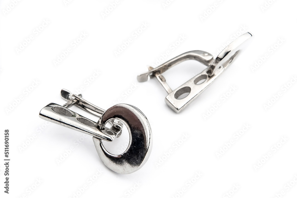 Luxury silver round earrings big jewelry for women isolated on white background, clipping path included Luxury silver round earrings big jewelry for women isolated on white background, clipping path included