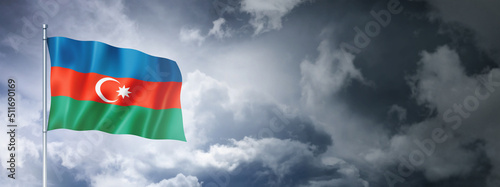 Azerbaijani flag on a cloudy sky