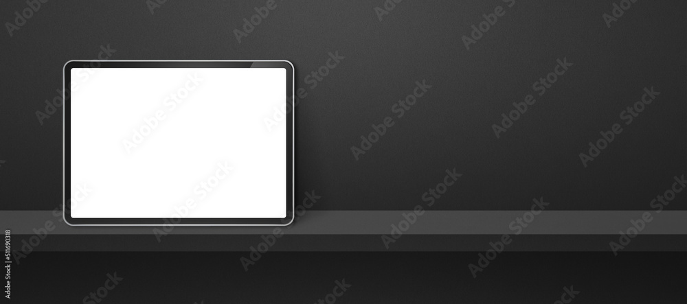 Digital tablet pc on black wall shelf. Background banner Digital tablet pc on black wall shelf. Background banner