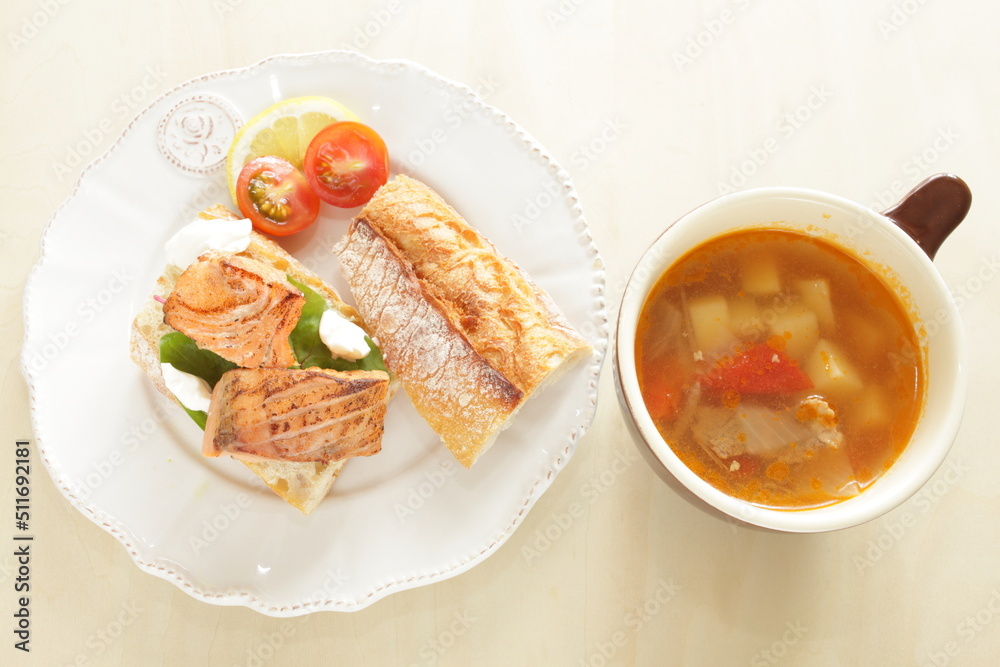 Homemade canned salmon fillet and French bread sandwiches with minestrone soup Homemade canned salmon fillet and French bread sandwiches with minestrone soup