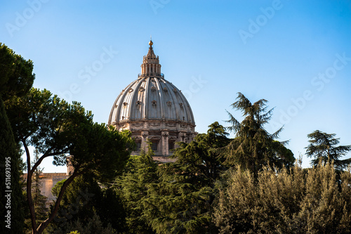 St Peter's Basilica on blue sky background. Vatican, Italy