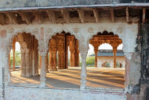 Beautiful arches of a pavilion lit by the evening lit during golden hour in the historic Lohagarh fort in Bharatpur in Rajasthan, India.