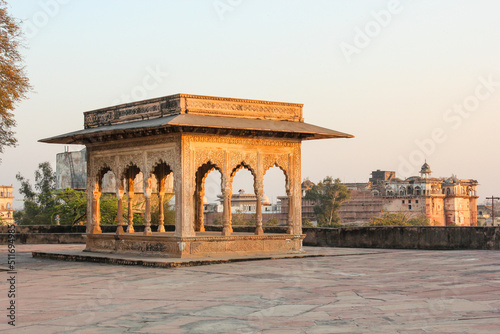 A beautiful ornate pavilion lit by evening light at the ancient Lohagarh fort in Bharatpur in Rajasthan, India. photo