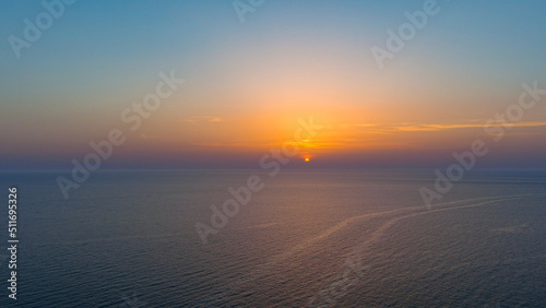 sunrise on mediterranean sea viewed from drone © Marc