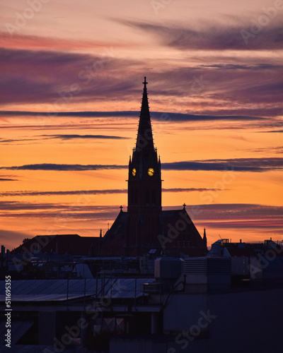 Beautiful Sunset in Vienna with the beautiful church in focus 
