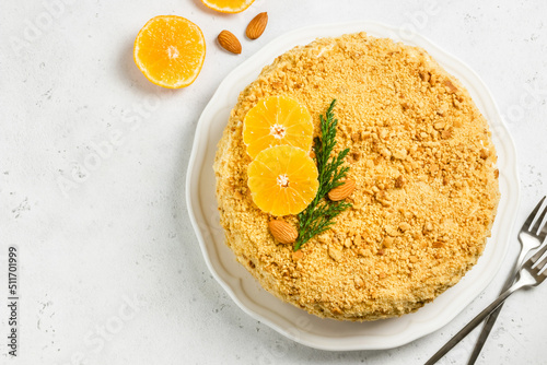 Honey tangerine cake on plate. Top view.