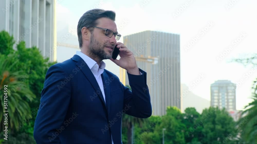 Close up confident businessman talking on phone on the street of new york, wall street. an American broker discusses with the head of the stock exchange charts of crypto-currencies Close up confident businessman talking on phone on the street of new york, wall street. an American broker discusses with the head of the stock exchange charts of crypto-currencies