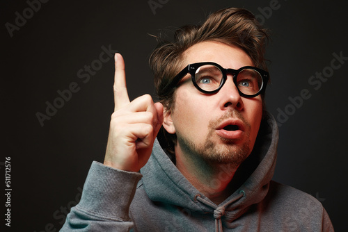 Emotional Man in glasses. funny guy having a good idea