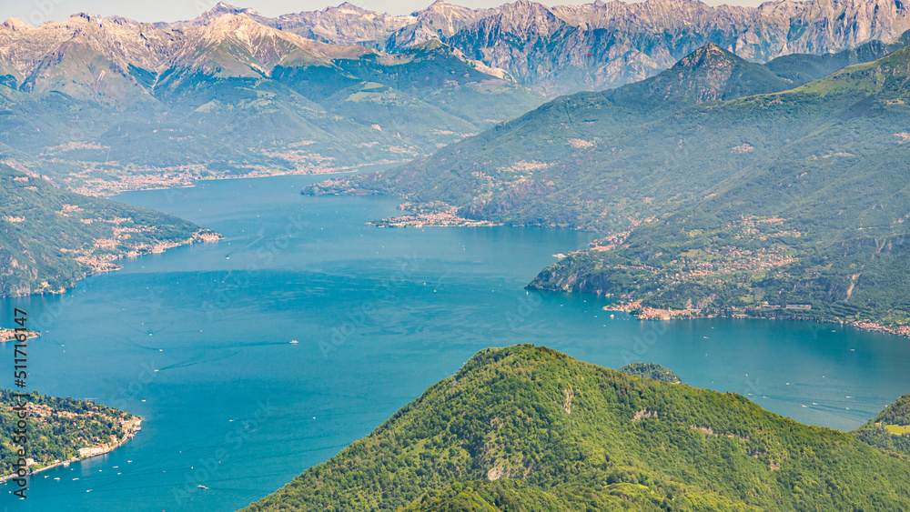 Aerial view of the northern part of Lake Como, Lombardy, Italy. The villages Varenna and Menaggio are visible. Italian alps on the background.