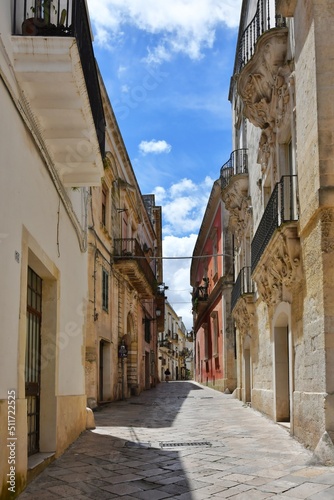A narrow street between the old houses of Galatina  an old village in the province of Lecce in Italy.