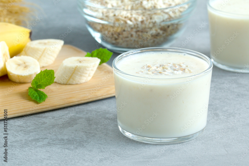 milkshake on the background of cereal flakes and ripe bananas milkshake on the background of cereal flakes and ripe bananas