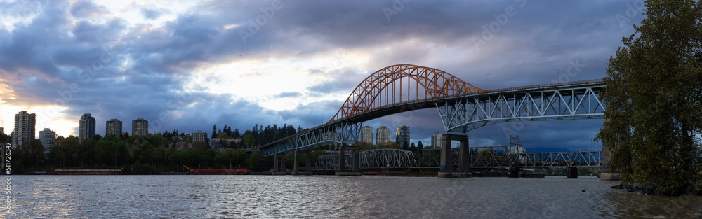 Pattullo Bridge in New Westminster and Surrey, Greater Vancouver, British Columbia, Canada. Sunset Sky. Brownsville Bar Park. Pattullo Bridge in New Westminster and Surrey, Greater Vancouver, British Columbia, Canada. Sunset Sky. Brownsville Bar Park.