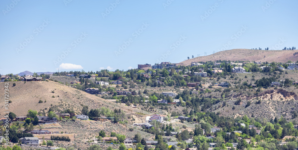 Residential Homes on top of a hill. Modern City. Sunny Spring Day in desert. Reno, Nevada, USA.
