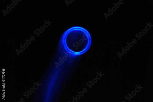 fancy compositions, black background with luminous blue, concentric shapes suggesting movement