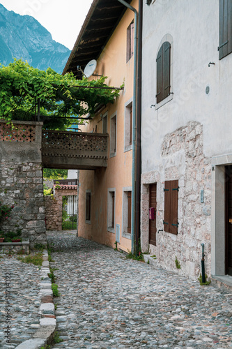 Fototapeta Naklejka Na Ścianę i Meble -  Italy, June 2022: view of the village of Venzone, destroyed and rebuilt after the 1976 earthquake, in the Friuli Venezia Giulia region