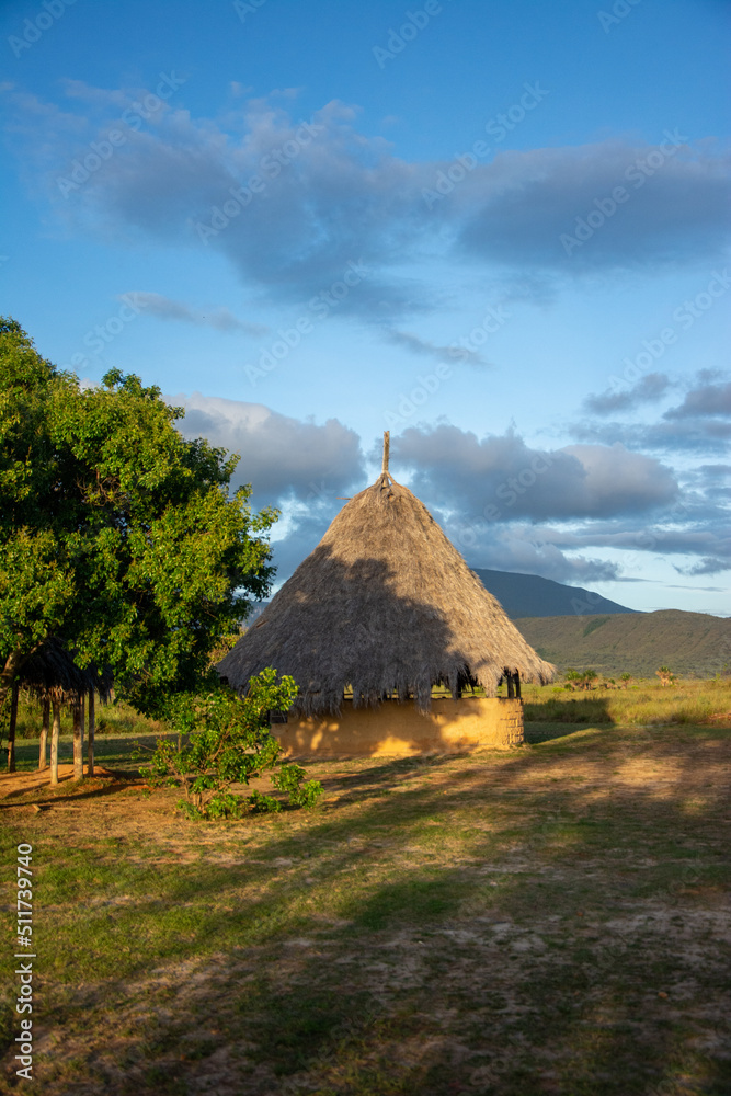 Indigenous dwellings of the Bolivar State. National park Canaima. Pemona houses. Palm roofs. Guayanes Massif. Indigenous dwellings of the Bolivar State. National park Canaima. Pemona houses. Palm roofs. Guayanes Massif.
