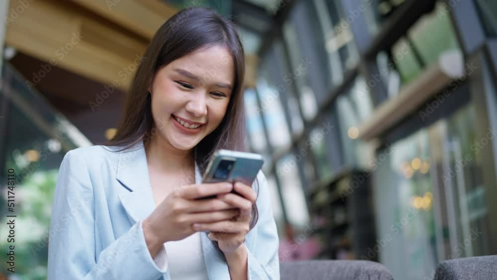 smart attractive asian female business woman casual cloth freelance work leisure relax working with tablet and smartphone at cafe restaurant urban lifestyle digital nomad working in co working space