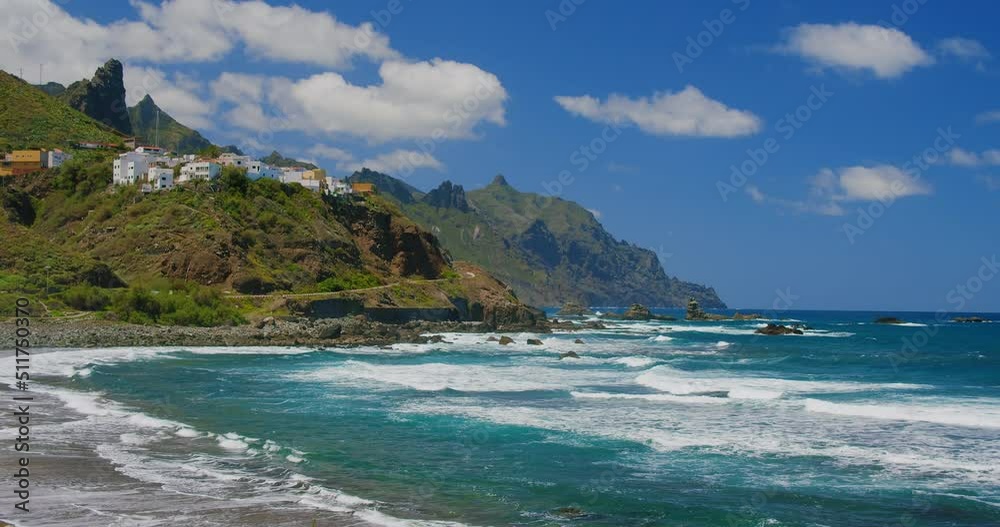 Rocky coast and Almaciga beach with cute colourful village in north of Tenerife, Canaries. Spain. Rocky coast and Almaciga beach with cute colourful village in north of Tenerife, Canaries. Spain.
