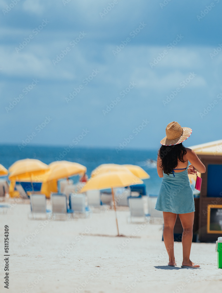 woman on the beach in miami summer  