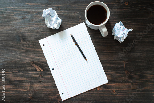 cup of coffee and notebook work space or desk top