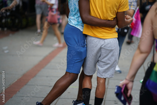 lower body of couple of gay african american gay dancing in street 