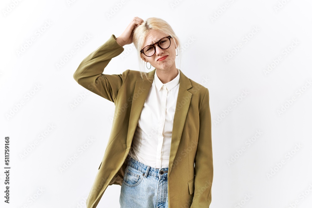 Beautiful caucasian business woman standing over isolated background confuse and wondering about question. uncertain with doubt, thinking with hand on head. pensive concept. Beautiful caucasian business woman standing over isolated background confuse and wondering about question. uncertain with doubt, thinking with hand on head. pensive concept.