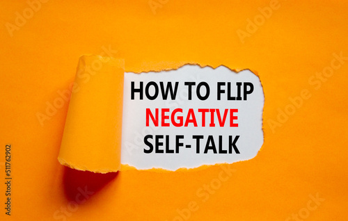 Flip negative self-talk symbol. Concept words How to flip negative self-talk on white paper on a beautiful orange background. Psychological and flip negative self-talk concept. Copy space.