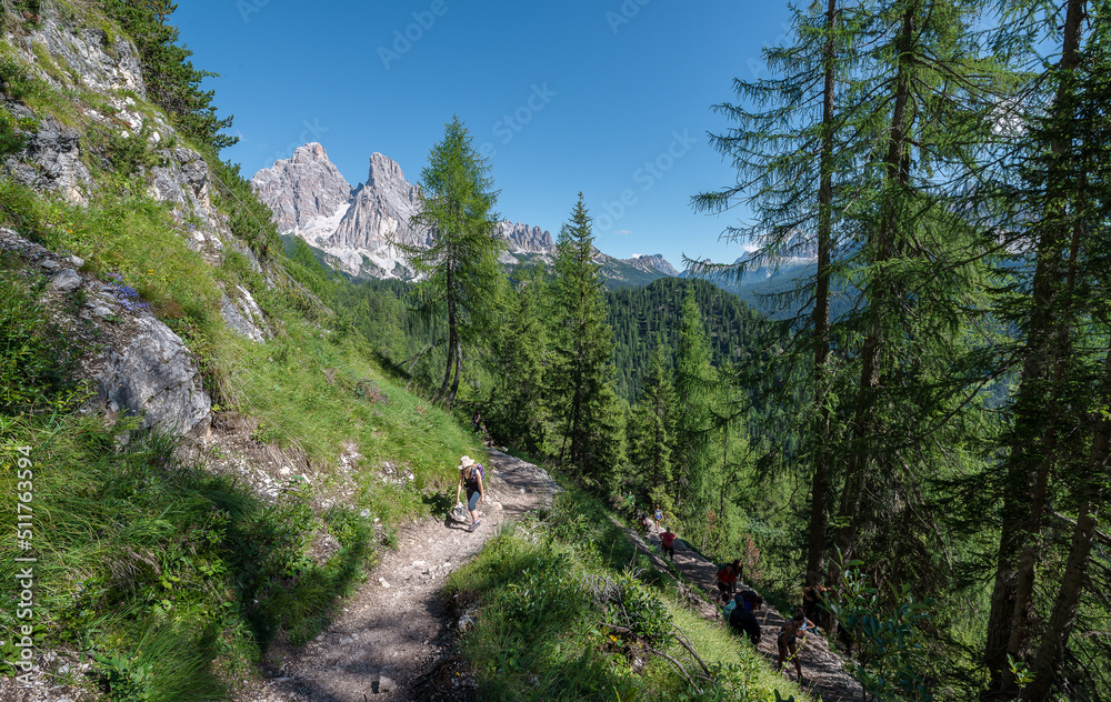 Female hiking in the Dolomites mountains