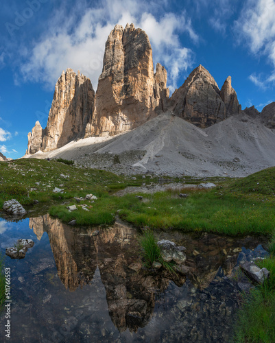 Mountain reflection in lake by Tre Cime di Lavaredo in Dolomites