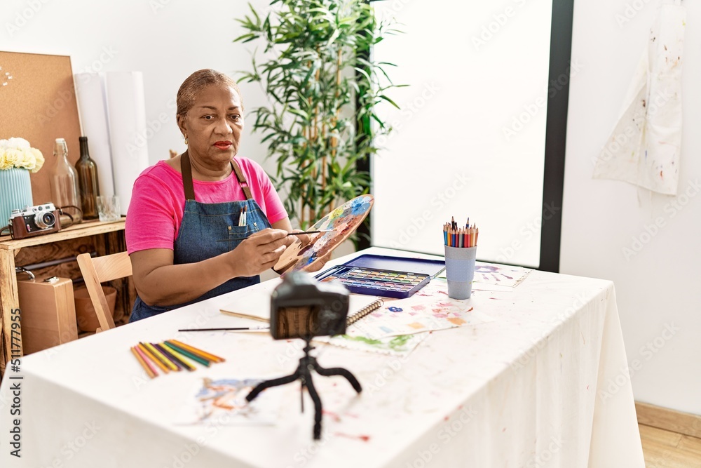 Senior african american woman recording draw tutorial at art studio Senior african american woman recording draw tutorial at art studio