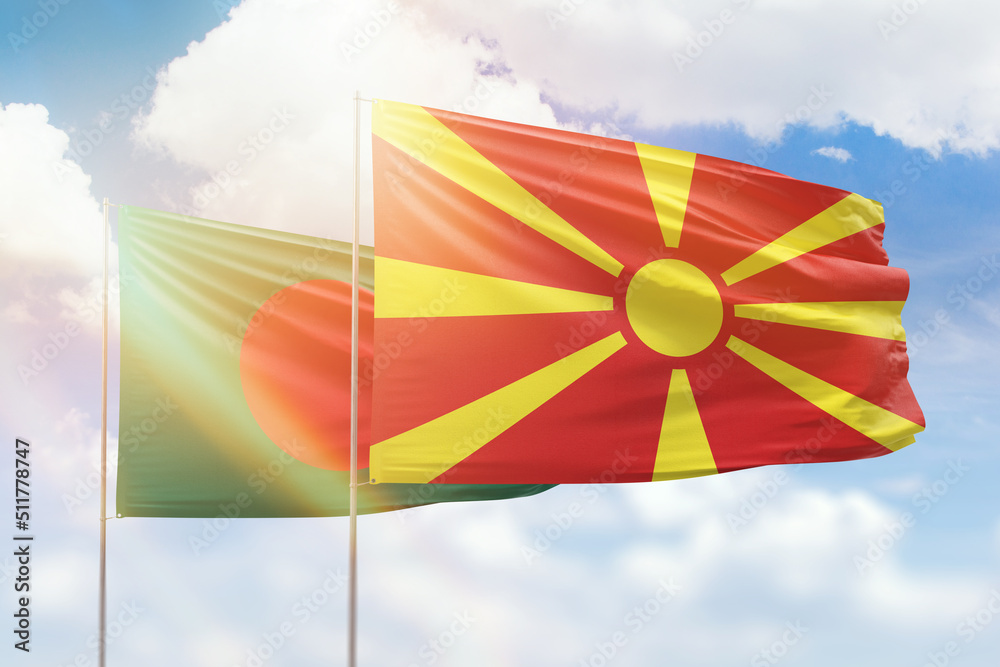 Sunny blue sky and flags of north macedonia and bangladesh Sunny blue sky and flags of north macedonia and bangladesh