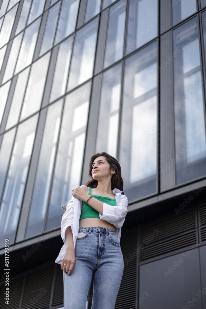 Freelance girl on the street with a phone leads her social life.