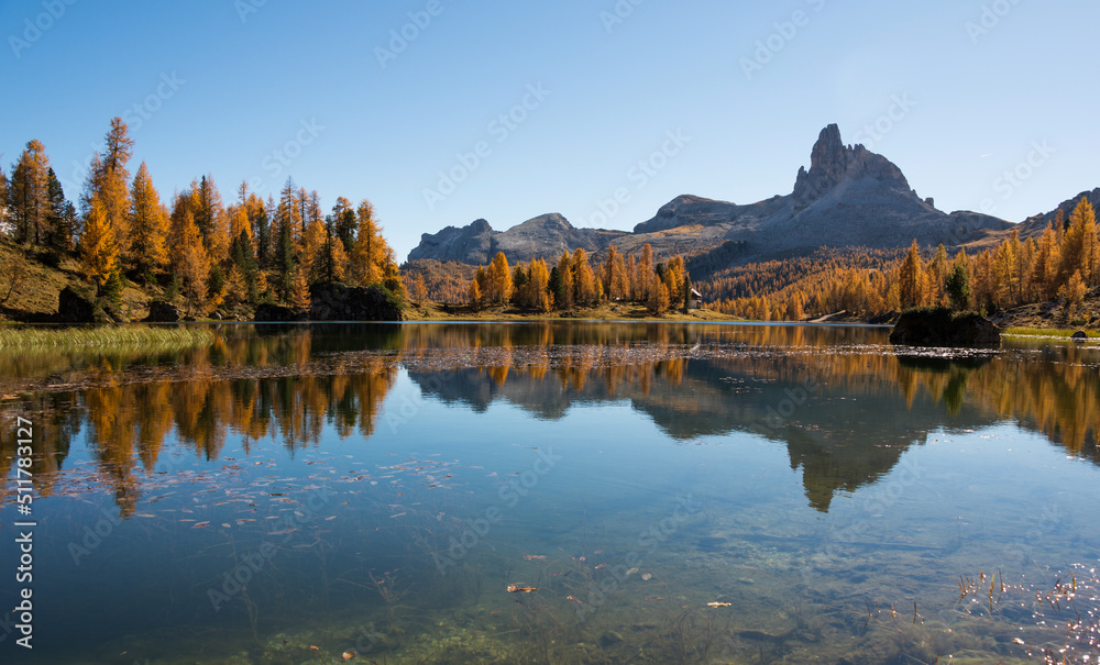 Autumn scenery at lake Federa in Dolomites