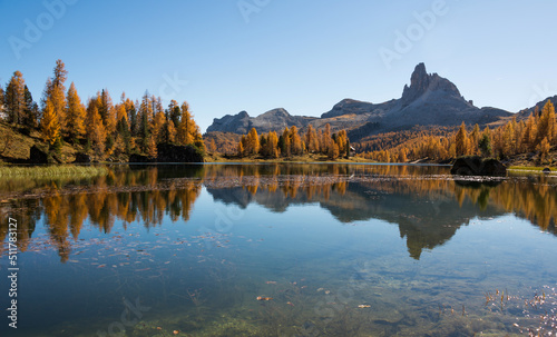 Autumn scenery at lake Federa in Dolomites