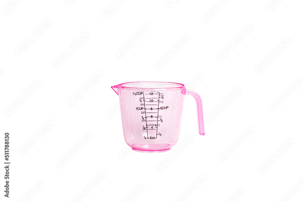 Empty pink measuring cup isolated on white background Empty pink measuring cup isolated on white background