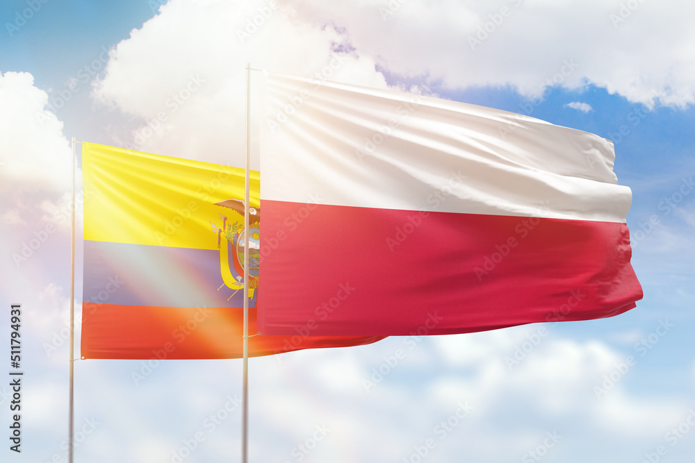 Sunny blue sky and flags of poland and ecuador Sunny blue sky and flags of poland and ecuador