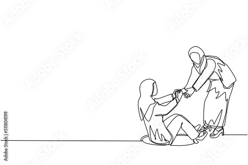 Single one line drawing Arab businesswoman helping her friend by take her out from hole. Two women one of whom helps another. Business struggle. Continuous line draw design graphic vector illustration