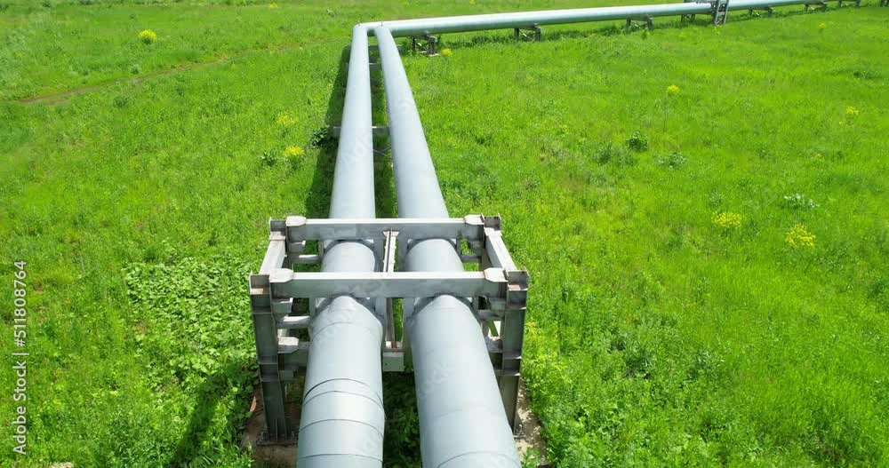 Aerial view of an industrial pipeline. Transportation of gaseous and liquid substances. Aboveground pipeline view from a height. Aerial view of an industrial pipeline. Transportation of gaseous and liquid substances. Aboveground pipeline view from a height.