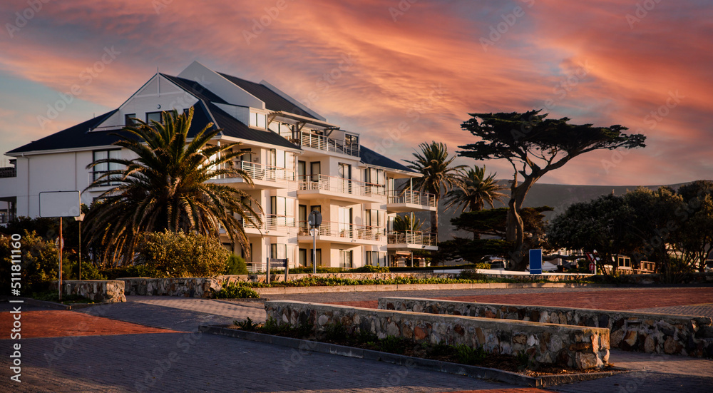 Beautiful panoramic photograph of the houses and the South African city of Hermanus, which is one of the southernmost cities in Africa and one of the best cities for whale watching from the cliffs. Beautiful panoramic photograph of the houses and the South African city of Hermanus, which is one of the southernmost cities in Africa and one of the best cities for whale watching from the cliffs.