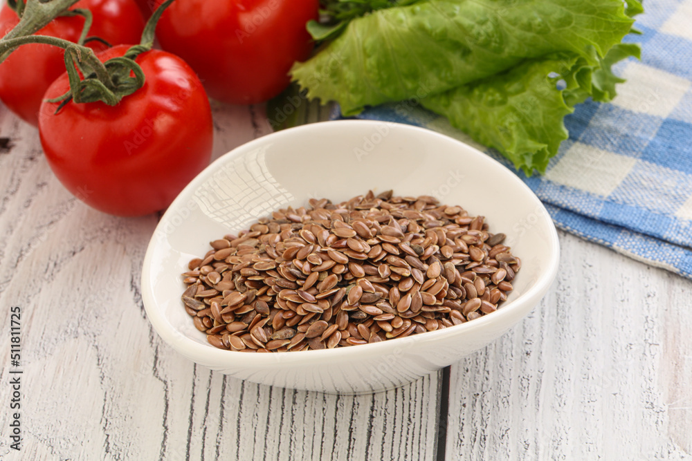 Dry Raw flax seed in the bowl Dry Raw flax seed in the bowl